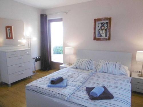 Ένα ή περισσότερα κρεβάτια σε δωμάτιο στο Villa Isabel and Imo