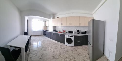 Η κουζίνα ή μικρή κουζίνα στο Apartament edy