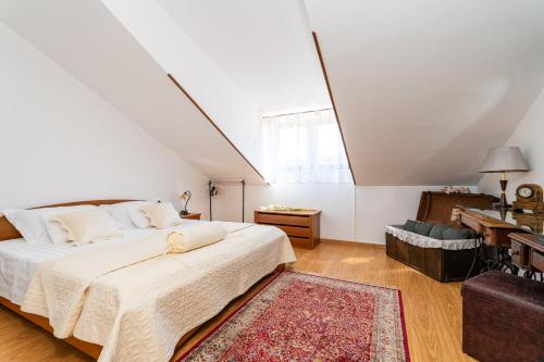 Postel nebo postele na pokoji v ubytování Apartmani Kadena