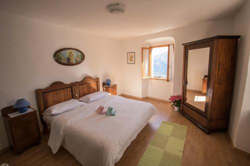 Postel nebo postele na pokoji v ubytování B&B Pregasina