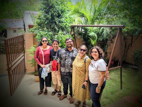 a group of people are posing for a picture at Erisha Tadoba in Mohurli