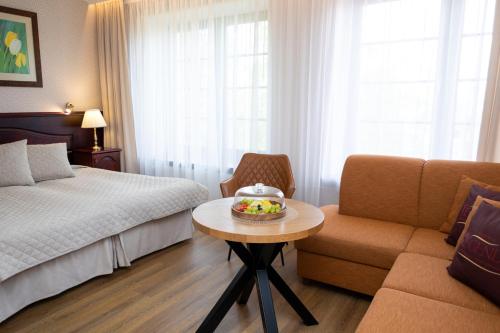 Zona de estar de Hotel Legend