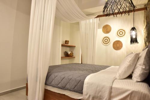 Кровать или кровати в номере Rafael Hotel-Adults Only