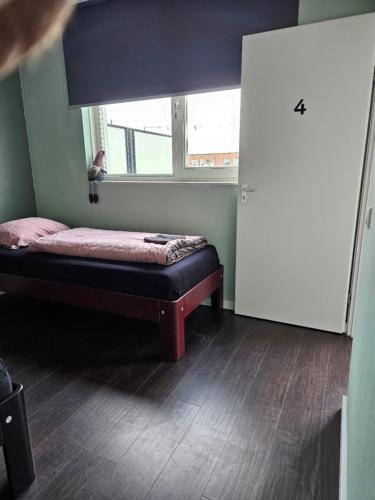 Ένα ή περισσότερα κρεβάτια σε δωμάτιο στο Residence Sanne