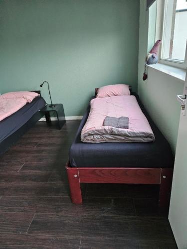 Ένα ή περισσότερα κρεβάτια σε δωμάτιο στο Residence Sanne