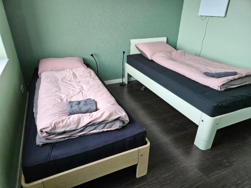 Ένα ή περισσότερα κρεβάτια σε δωμάτιο στο Residence Sanne