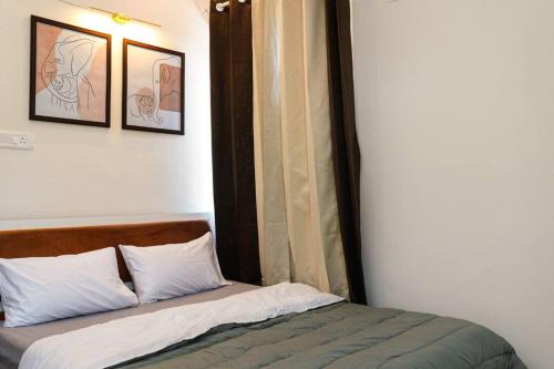 Katil atau katil-katil dalam bilik di A Homely 1 BHK in Main Kharadi - Anandkunj