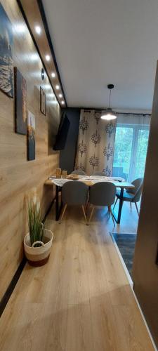 Televisyen dan/atau pusat hiburan di Apartamenty Trzy Kopce Ski & Bike & Sauna