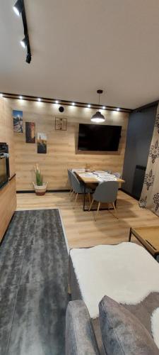 Ruang duduk di Apartamenty Trzy Kopce Ski & Bike & Sauna
