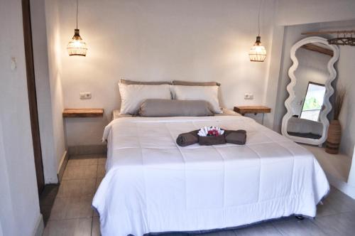 Ένα ή περισσότερα κρεβάτια σε δωμάτιο στο Ripbowl Guest House