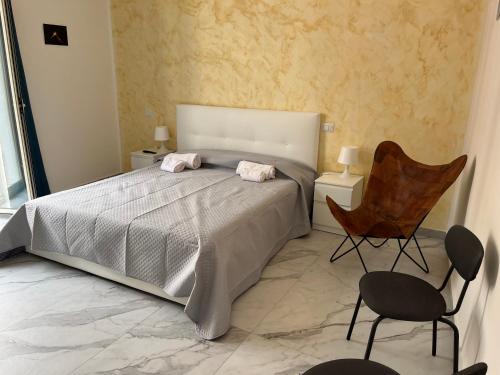 Ένα ή περισσότερα κρεβάτια σε δωμάτιο στο Stone House 2