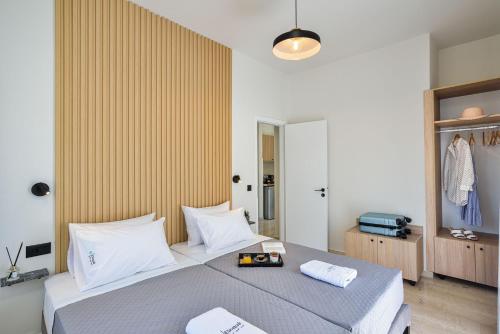 Una cama o camas en una habitación de Eloque Simple living space