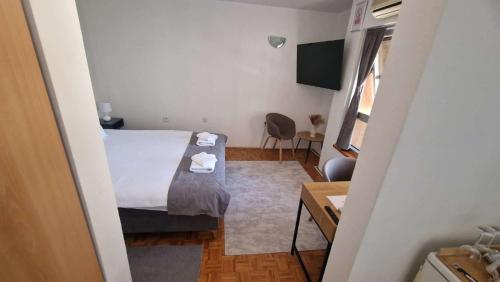 Μια τηλεόραση ή/και κέντρο ψυχαγωγίας στο Olimpus Apartmani BD Banjaluka