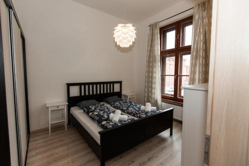 Posteľ alebo postele v izbe v ubytovaní Apartment Diana