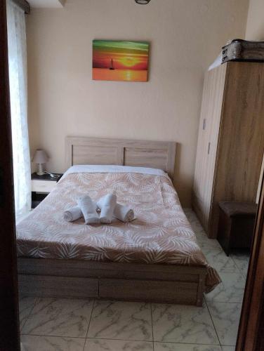 Ένα ή περισσότερα κρεβάτια σε δωμάτιο στο JIMMYS HOME