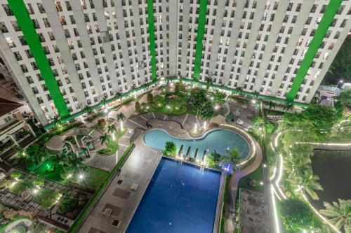 Bazén v ubytování Nusantara Pelangi Rooms By Reccoma nebo v jeho okolí