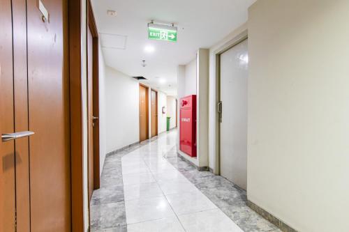 Fotografie z fotogalerie ubytování Nusantara Pelangi Rooms By Reccoma v destinaci Pondokcabe Hilir