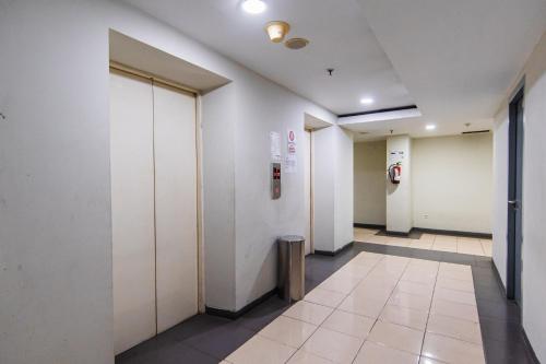 Fotografie z fotogalerie ubytování Nusantara Pelangi Rooms By Reccoma v destinaci Pondokcabe Hilir