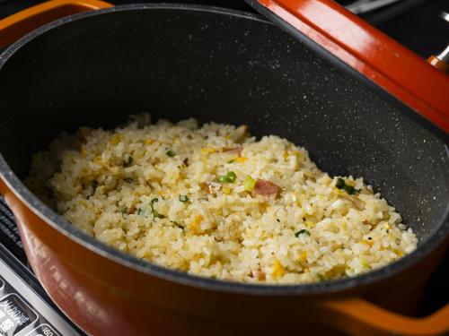 a pot filled with rice on a stove at Hotel Wing International Select Osaka Umeda in Osaka