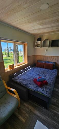 Ein Bett oder Betten in einem Zimmer der Unterkunft Trammi Maja