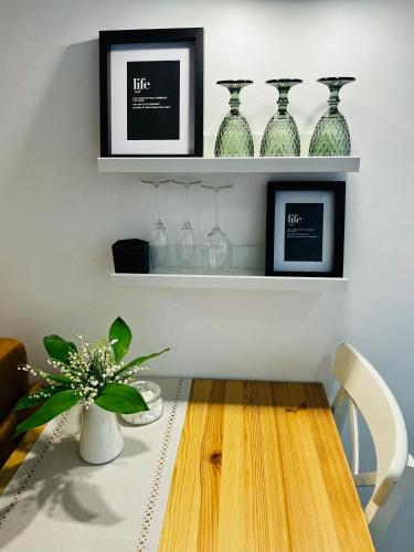 Kuchyň nebo kuchyňský kout v ubytování GREEN Apartment