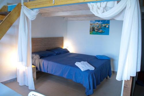 Postel nebo postele na pokoji v ubytování Aeolian Sea House