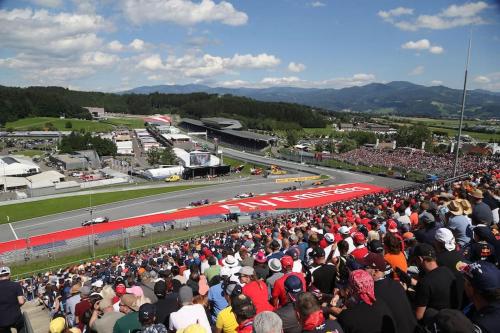 a crowd of people watching a race on a track at Charmante Ferienwohnung in Vordernberg - Alpenidylle pur in Vordernberg