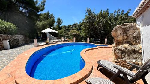 Bazén v ubytování Cortijo El Majito nebo v jeho okolí