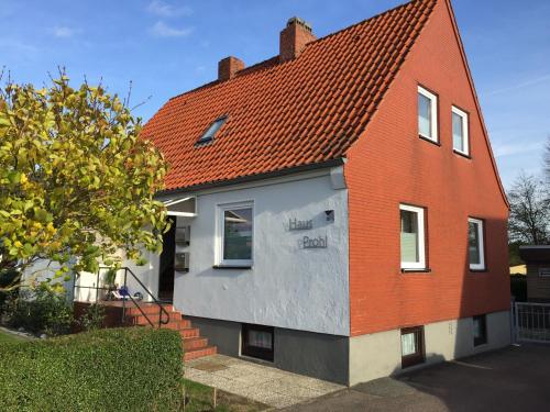 a house with an orange roof at Haus Prohl Whg1 in Dahme