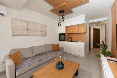 Una televisión o centro de entretenimiento en Comanda LUXURY APARTMENTS