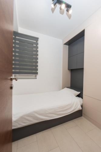 Cama o camas de una habitación en Comanda LUXURY APARTMENTS