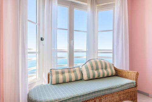 Postel nebo postele na pokoji v ubytování WintowinRentals 1ª Linea de Playa, Parking y WIFI