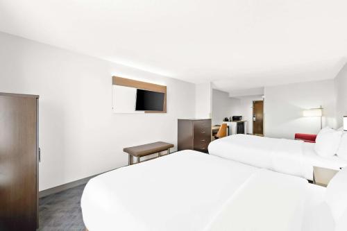 Letto o letti in una camera di Comfort Suites Columbus