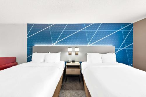 Letto o letti in una camera di Comfort Suites Columbus