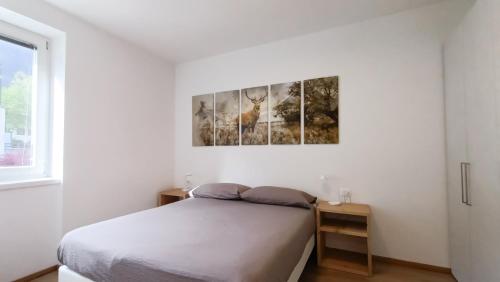 מיטה או מיטות בחדר ב-Relais Gentilini