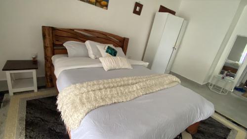 Utulivu Houseにあるベッド