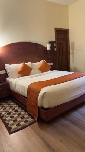 Postel nebo postele na pokoji v ubytování Indeevara Luxury Resort and Spa, Wayanad
