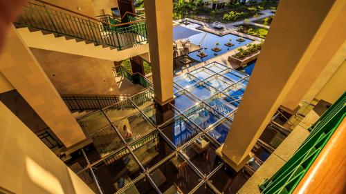 an overhead view of a pool in a building at Savoy Seychelles Resort & Spa in Beau Vallon