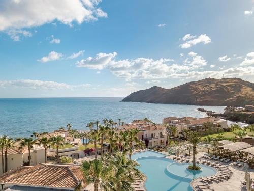 a view of the ocean from a resort at Grecotel Marine Palace & Aqua Park in Panormos Rethymno