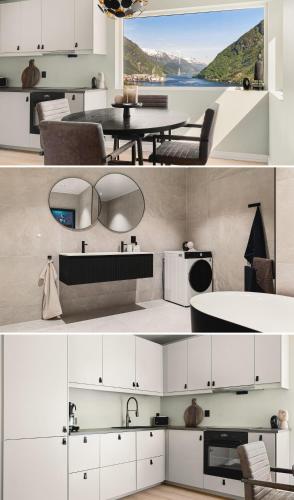 a kitchen with white cabinets and a living room at Odda Atmosphere in Odda