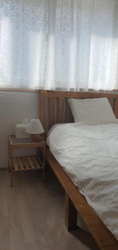 Ein Bett oder Betten in einem Zimmer der Unterkunft Yoon stay