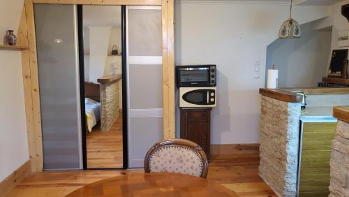 Kuchyň nebo kuchyňský kout v ubytování Charme studio