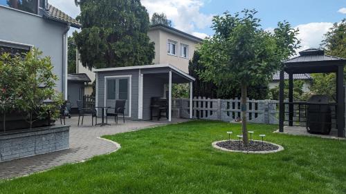 Zahrada ubytování 3 ROOMS - Zimmervermietung nähe Flughafen BER - gratis WLAN, Parken & Netflix