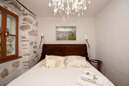 Postel nebo postele na pokoji v ubytování House Villa Losinj
