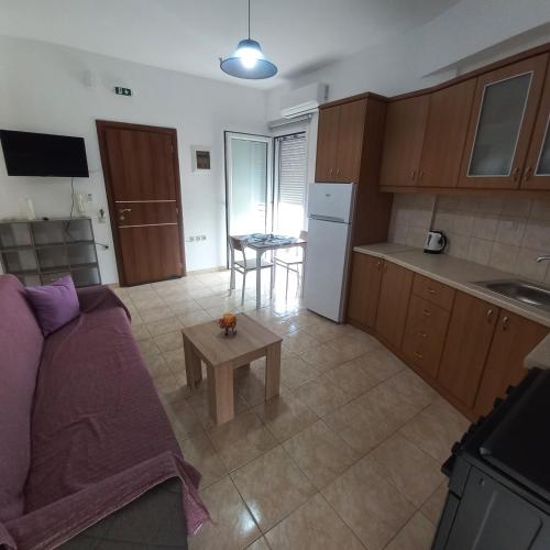 Kuchyň nebo kuchyňský kout v ubytování Central Rooms