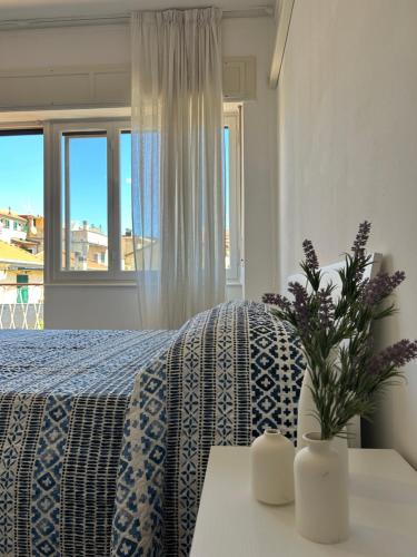 Postel nebo postele na pokoji v ubytování RivieraRent Ca Bolla sul mare MTB paradise