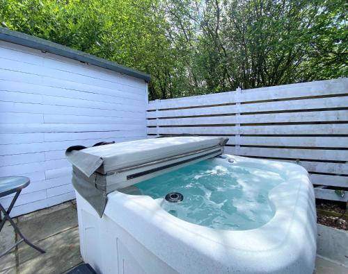 The swimming pool at or close to Hunters Hideaway-Hot Tub-Wiltshire-Groups