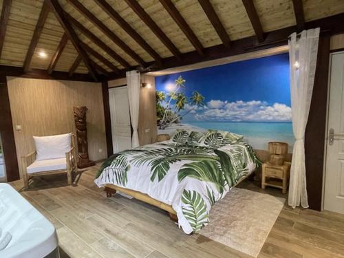 a bedroom with a bed and a view of the ocean at La Ferme Briarde in Couperdrix