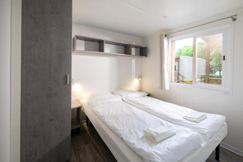 Postel nebo postele na pokoji v ubytování Bella Camping