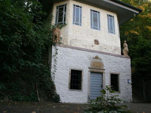 a building with two cats sitting on top of it at Holiday apartment Bodenwerder in Bodenwerder